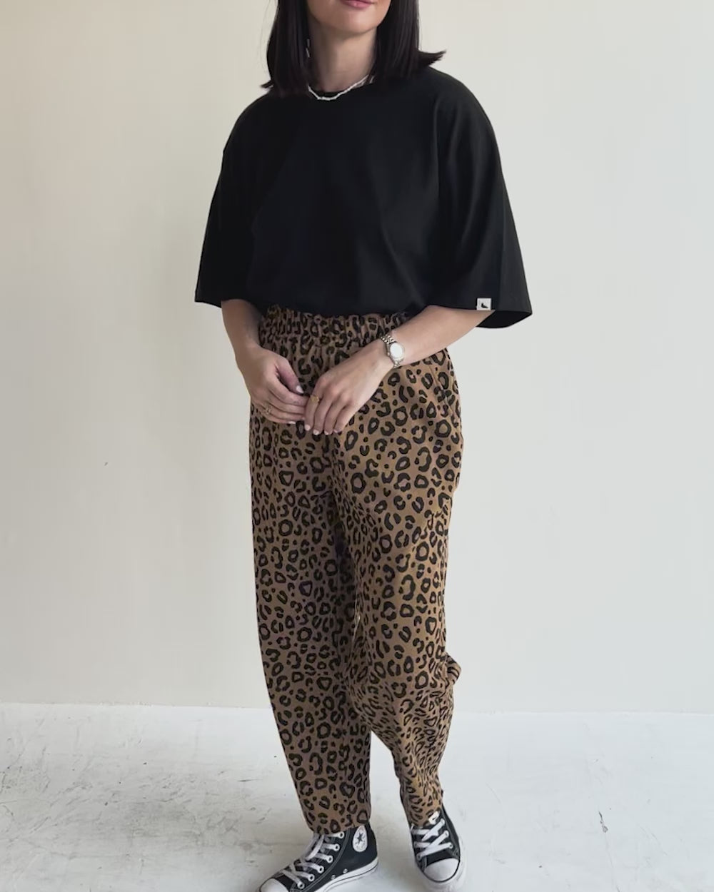 video showing organic cotton Kate Brown Mini Animal Print Barrel Leg Trousers