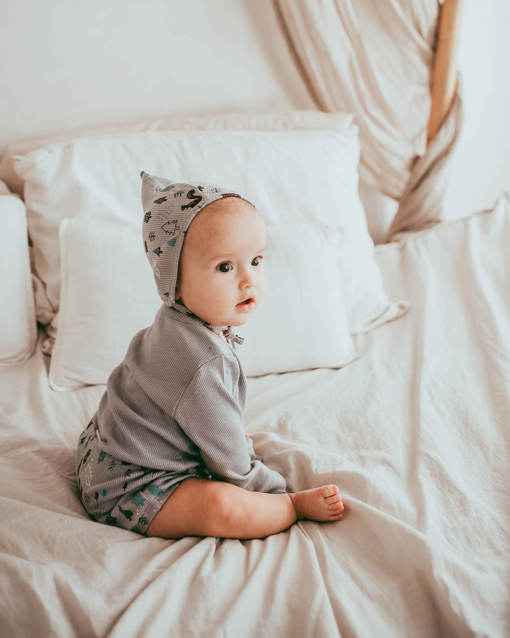 Baby wearing organic cotton baby pants