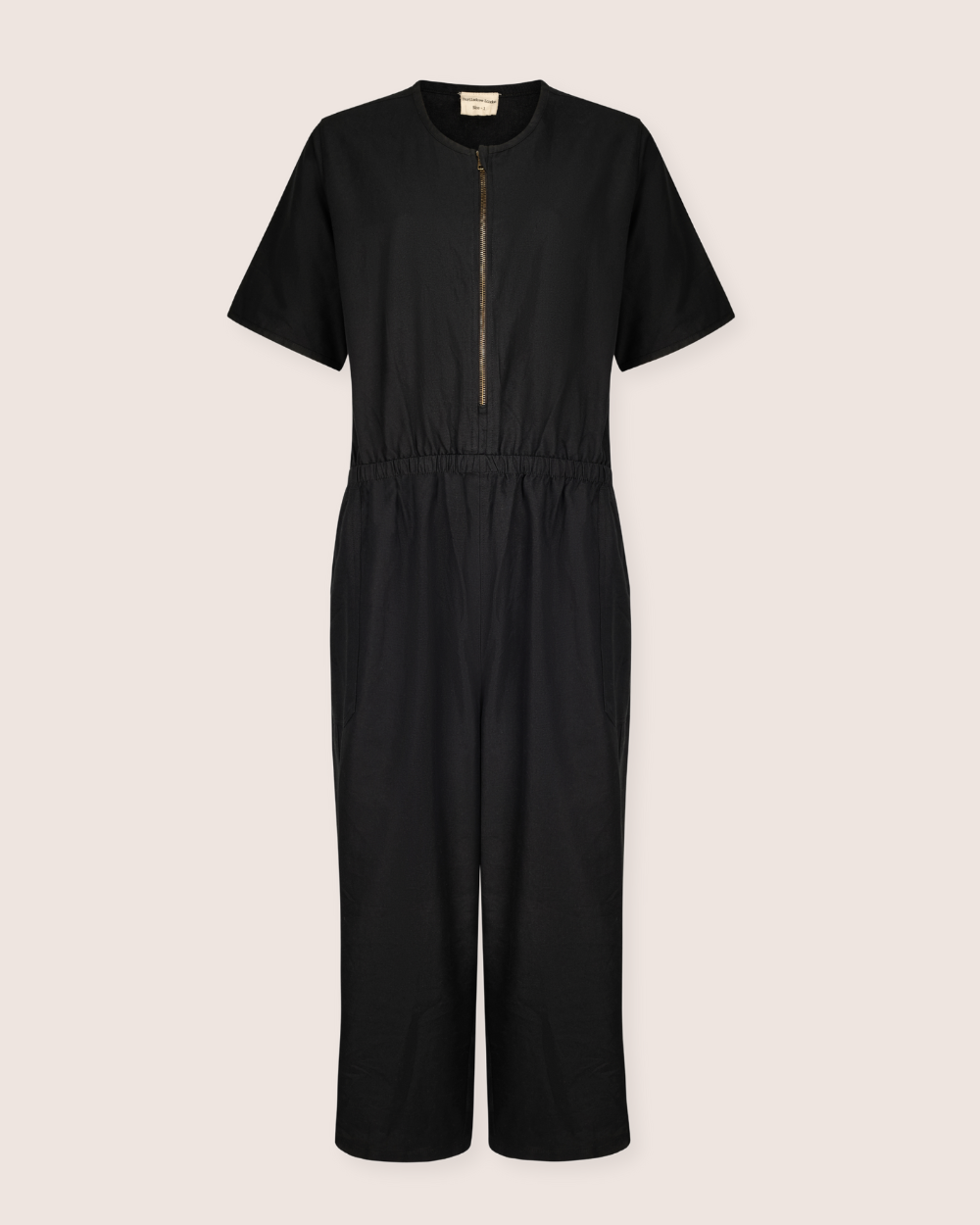 Discover effortless elegance with the Ethel Twill Black Jumpsuit, crafted from organic cotton for a breathable, sustainable summer style. A metallic front zipper ensures easy breastfeeding access, while an elastic waistband accents its minimalist design against a neutral backdrop.