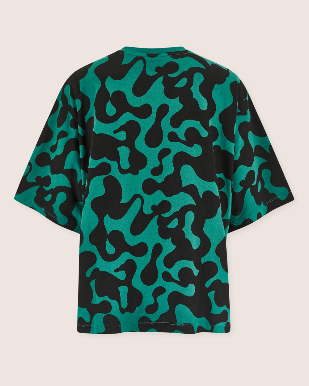 The Elsie Misty Print T-Shirt is a green and black organic cotton short-sleeve jersey adorned with a bold, abstract all-over print of fluid shapes, creating a striking visual texture against a plain backdrop.