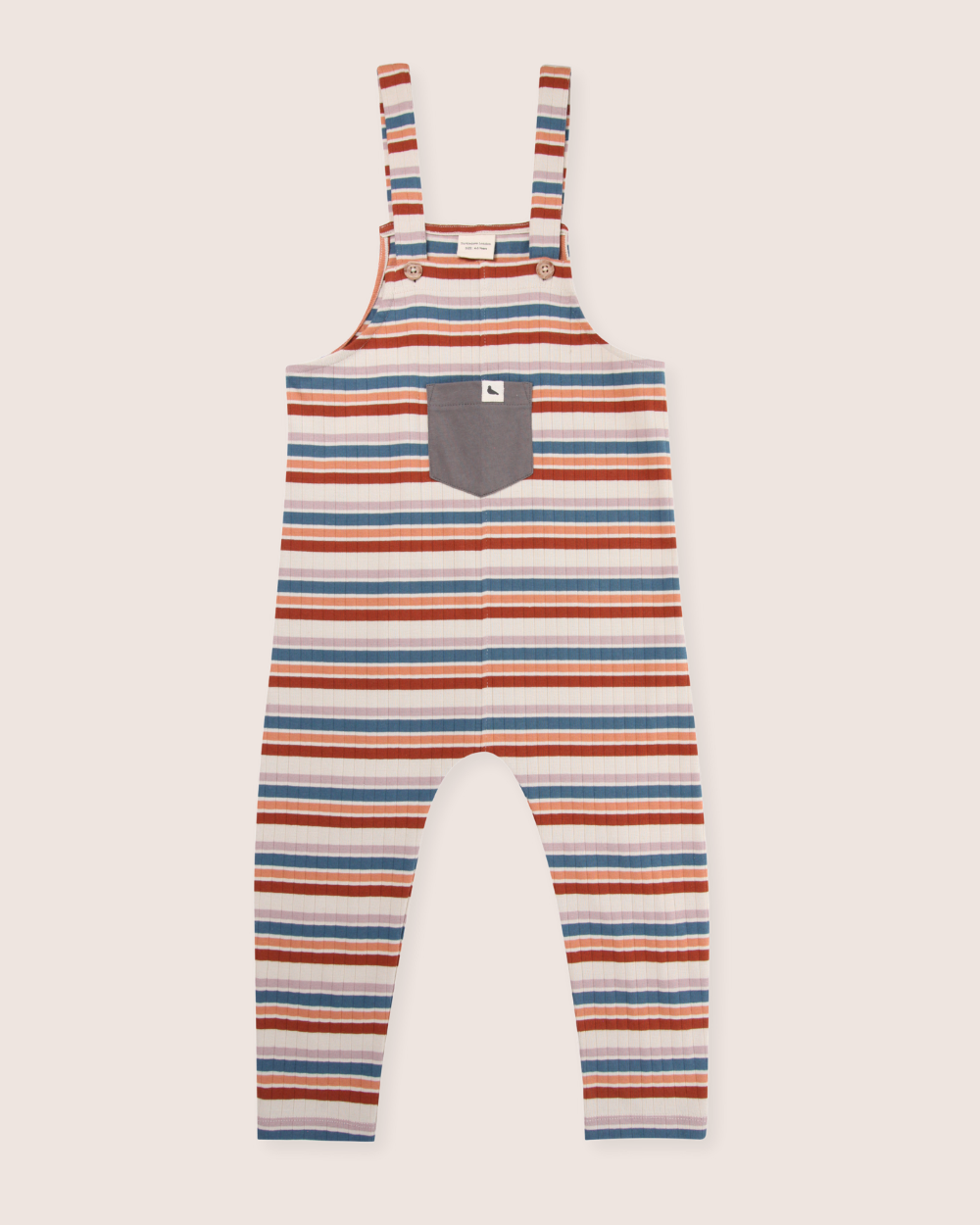 Multi Stripe Dungarees: Orange, blue, and white striped childrens overalls with adjustable button-fastened straps. Made from organic cotton with a gray front pocket, they are gender-neutral and ideal for sustainable wardrobes. Displayed against a light background.