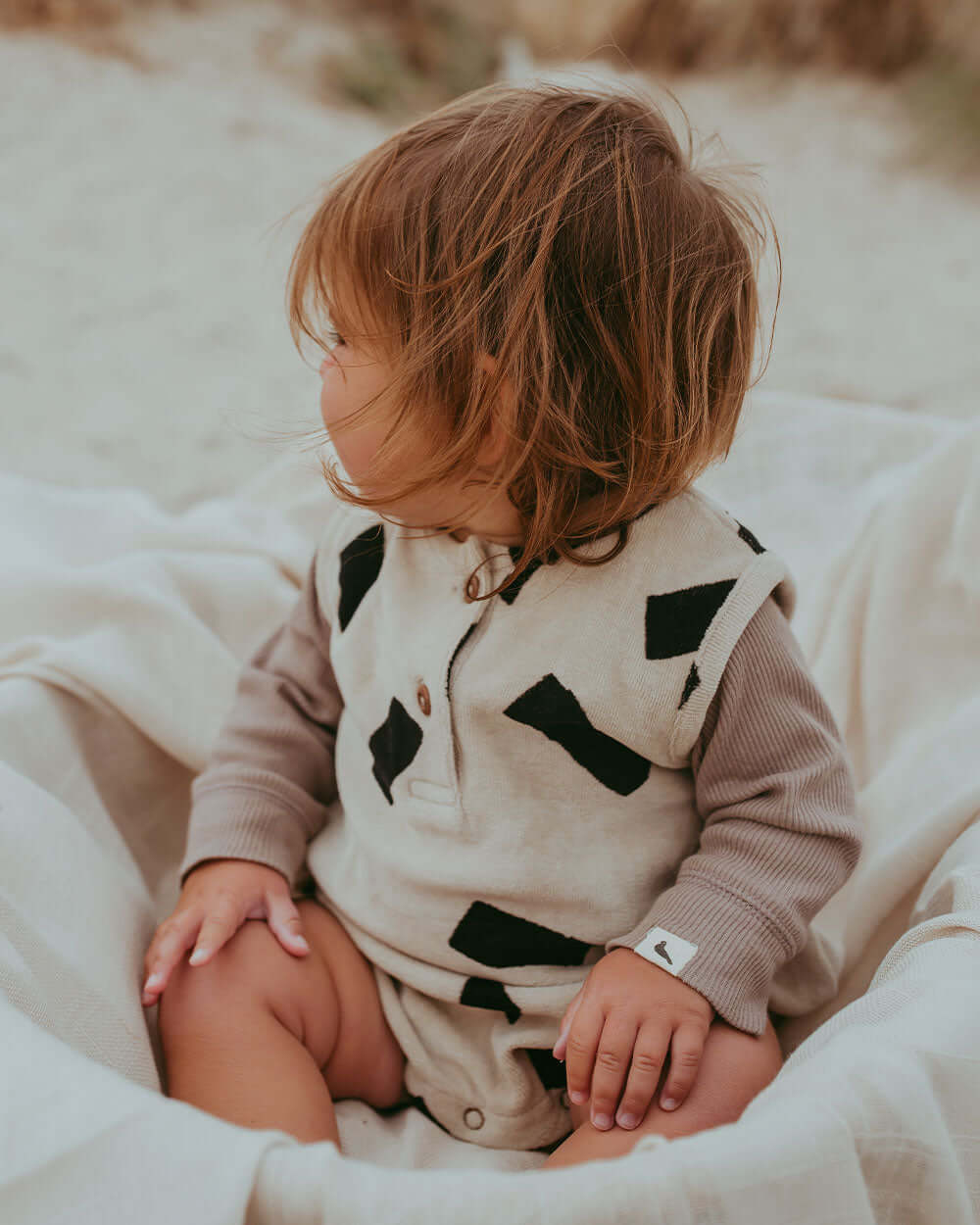 Baby girl wearing velour baby romper