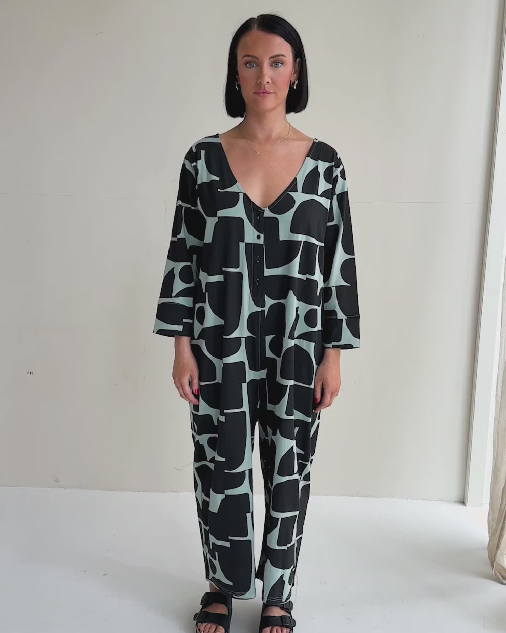 organic cotton Mai Green Cairn Print V- Neck Jumpsuit - video