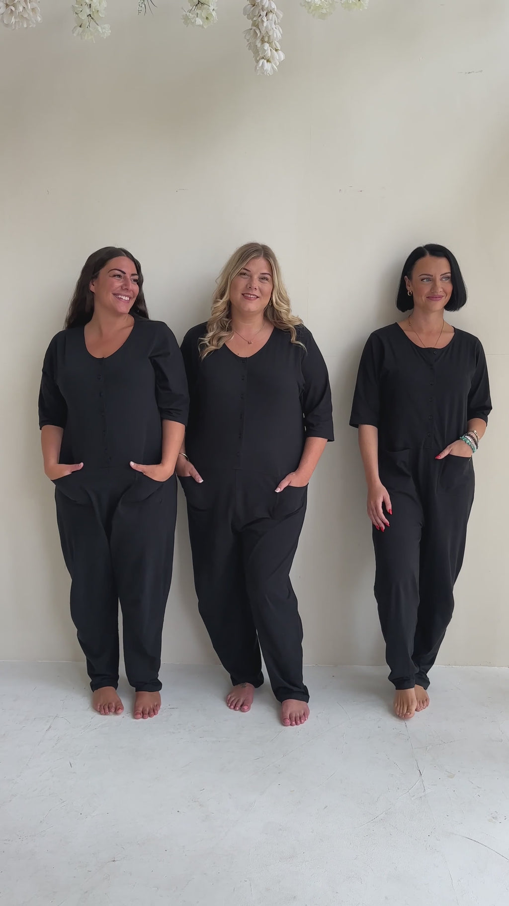 video shoiwng Mila Black Long Sleeve Jumpsuit
