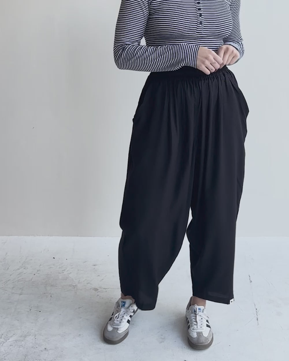 video showing Betty Black Drape Trousers