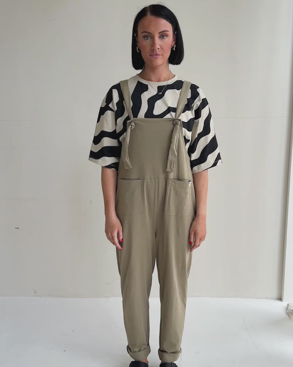 video showing organic cotton Lila Khaki Green Dungarees 