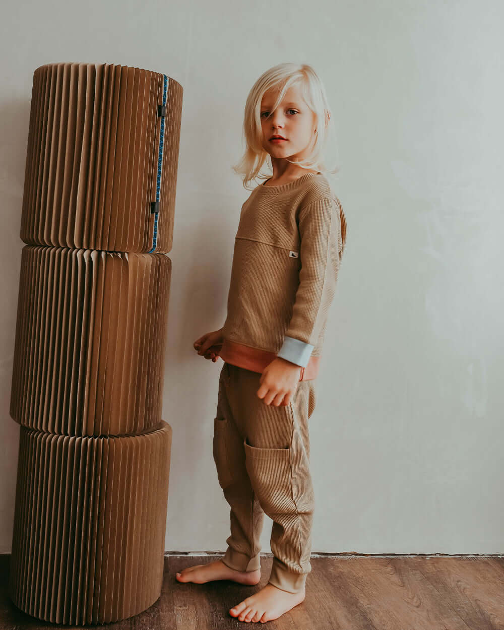Boy wearing unisex organic cotton kids harems