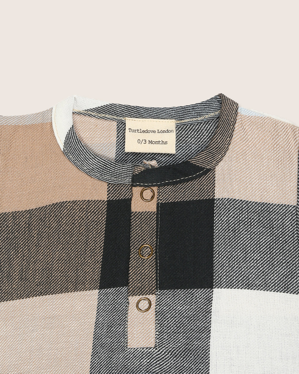 Gender-neutral organic cotton baby romper