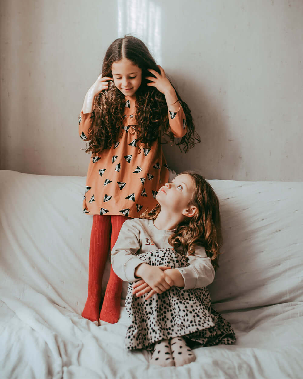 Girl wearing organic kids knit tights