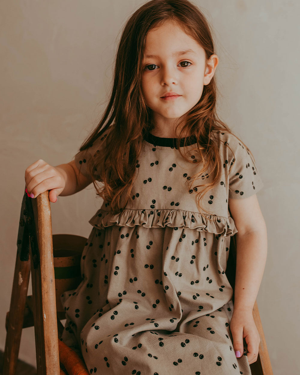 Girl wearing organic cotton kids dress