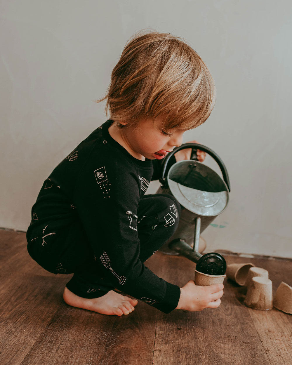 Boy wearing gender-neutral organic cotton kids joggers
